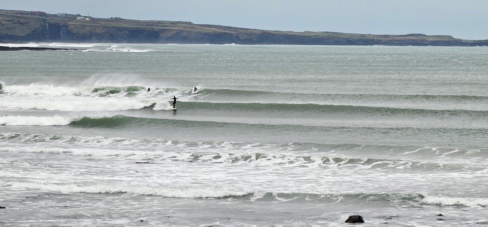 Surfer on a hip high wave at Lahinch Left